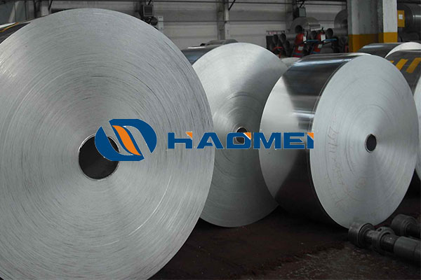 This shows slitting of aluminium strip.